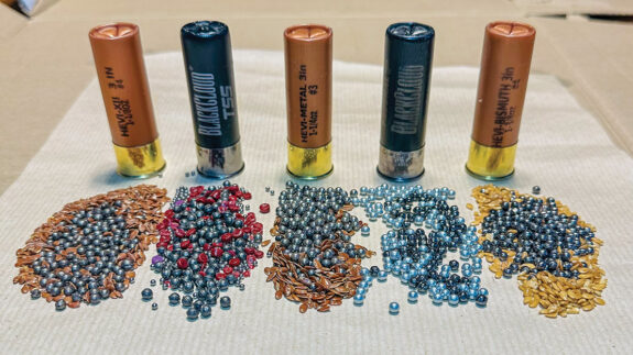 From left to right: HEVI-XII, Black Cloud TSS, HEVI-Metal, Black Cloud Premium and HEVI-Bismuth with various shot sizes and seed/plastic packers. The packers are designed to stop the heavy metal shot from colliding with each other and thus pattern in a uniform manner; the seed is, of course, sterilised.