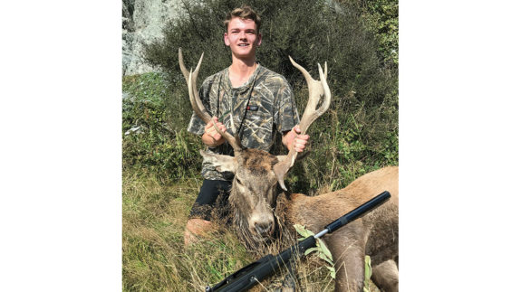 Liam Kilmore – big smiles after shooting his trophy, even with the funky antlers.