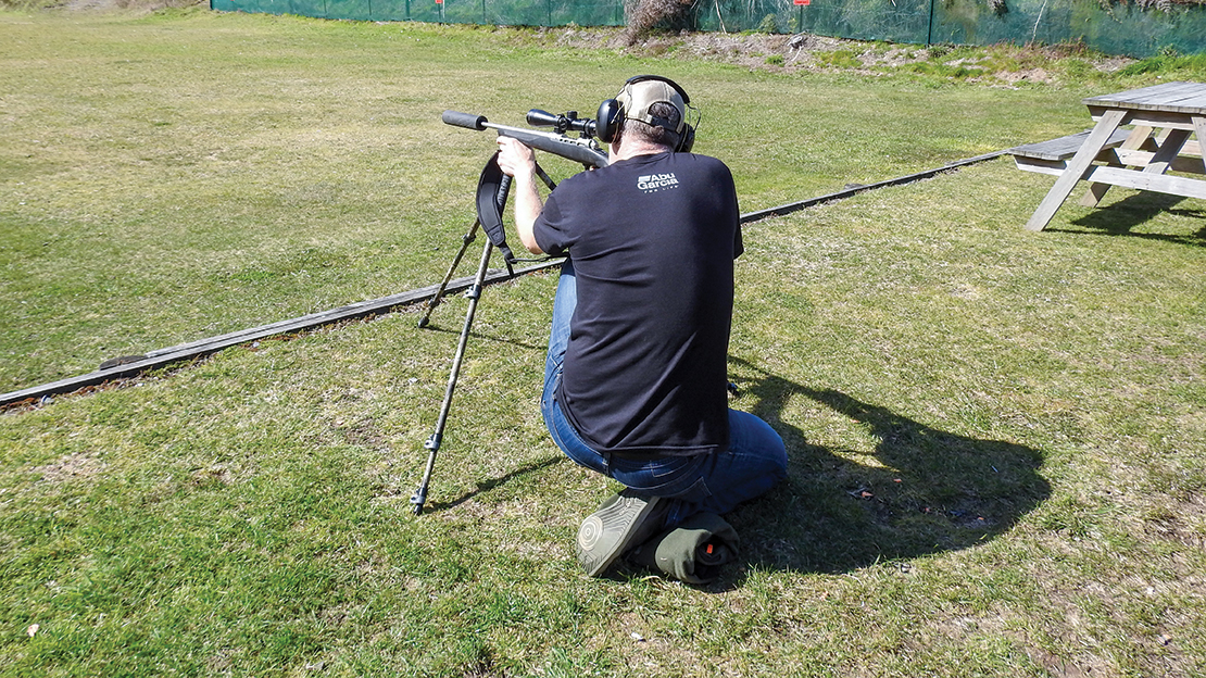 Practising shooting from a kneeling position using the sling swivel mount.