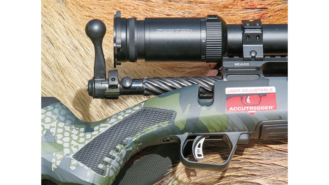 The bolt is fluted to reduce weight. Fluting also improves cycling when dirt and debris is common. Note the AccuTrigger and bolt-release button at the front of the trigger guard.