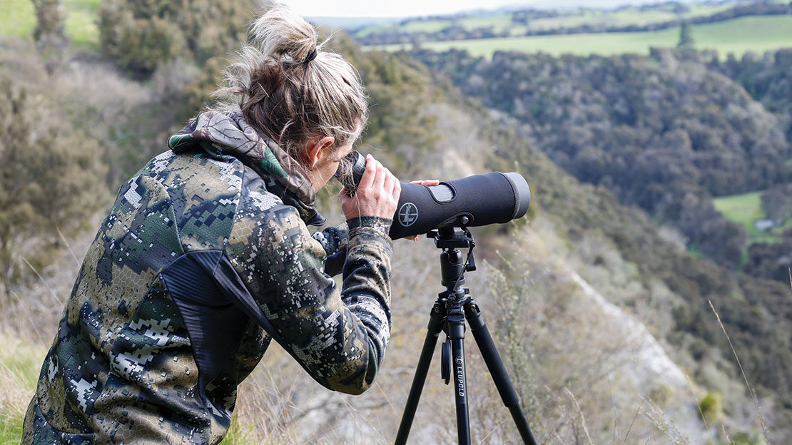 Janine lines up a deer a long way off with the new Leupold Pro Guide spotter.