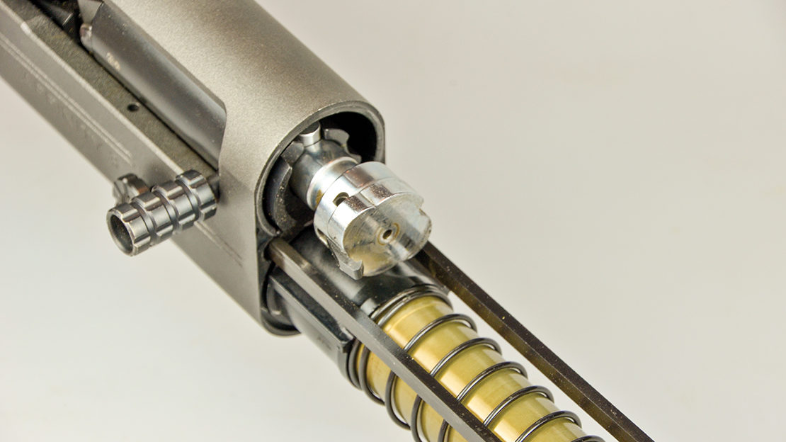 The Benelli-designed rotary bolt is mounted on twin action bars while the main spring is located around the magazine tube.