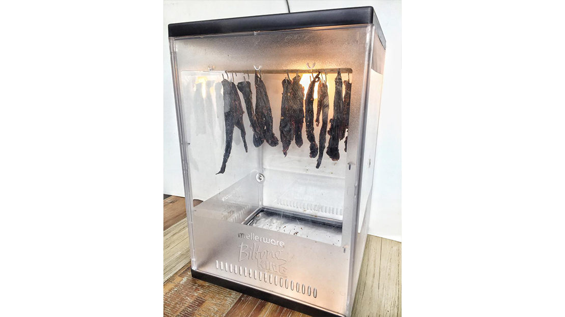 Biltong drying in Biltong drier with light and fan
