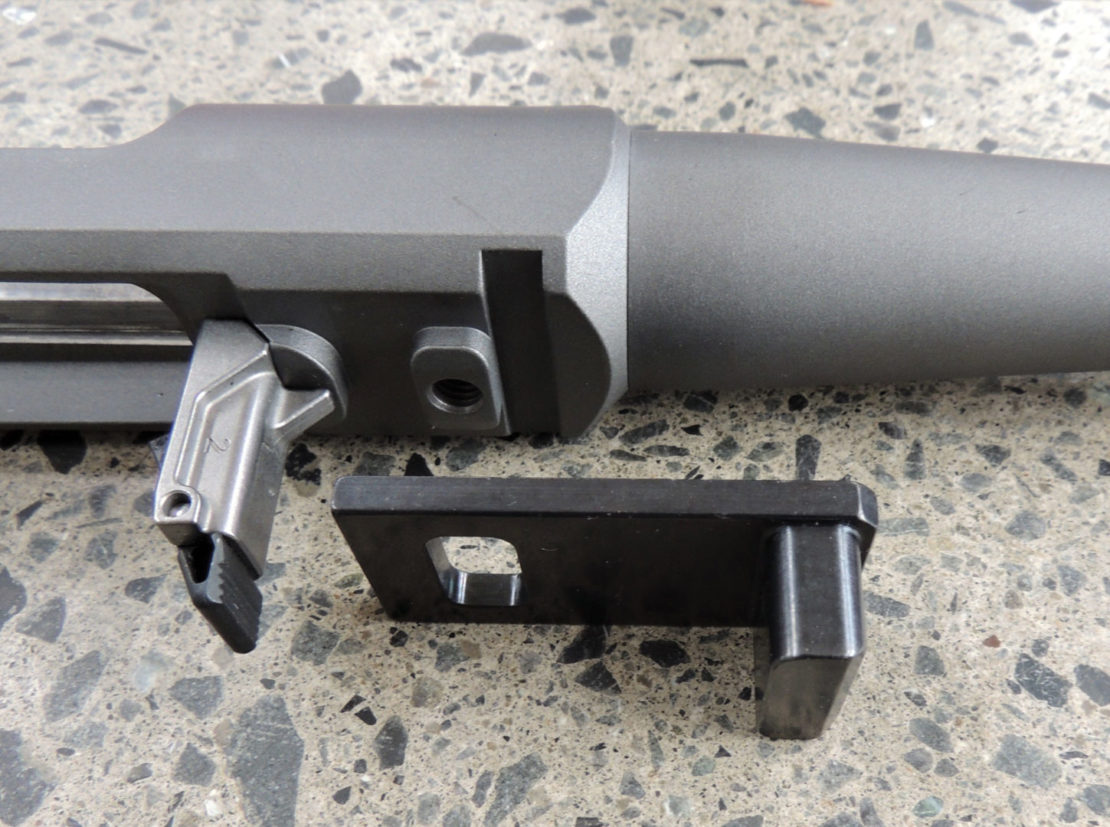 The recoil lug is a separate piece that allows for a strong interface with the stock.